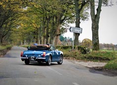 open top car touring in Scotland